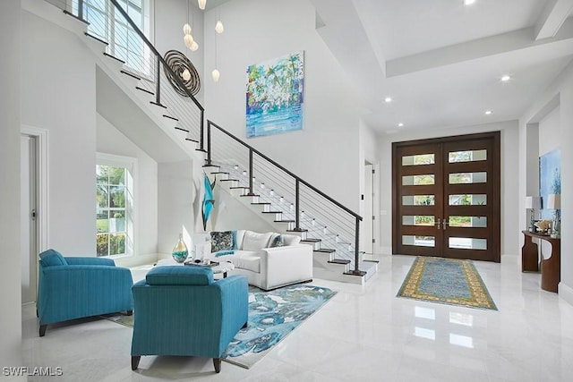 803 Shadow Lake Ln, Naples, FL 34108 - foyer entrance with stairs, recessed lighting, and a towering ceiling