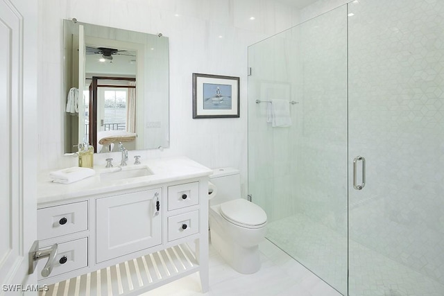 803 Shadow Lake Ln, Naples, FL 34108 - ensuite bathroom featuring toilet, a shower stall, and vanity