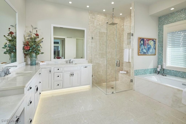 803 Shadow Lake Ln, Naples, FL 34108 - full bath with a stall shower, a bath, double vanity, and recessed lighting