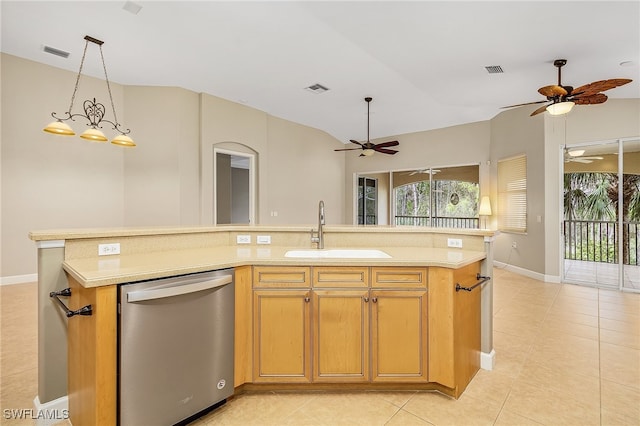 kitchen featuring ceiling fan, a center island with sink, and stainless steel dishwasher