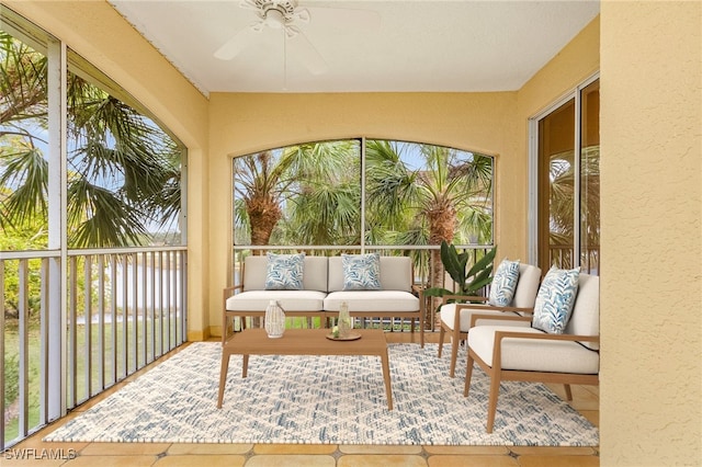 sunroom / solarium with ceiling fan