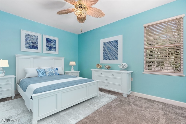 bedroom with light carpet and ceiling fan