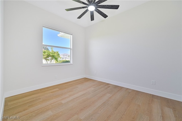 unfurnished room with ceiling fan and light hardwood / wood-style flooring