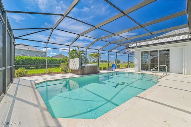 view of swimming pool featuring glass enclosure and a patio