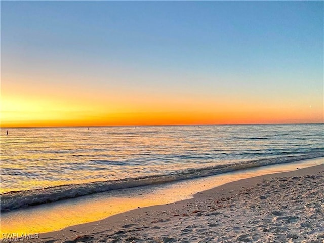 property view of water featuring a beach view