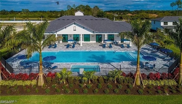 view of swimming pool featuring a patio