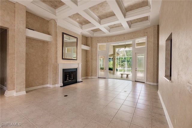 unfurnished living room featuring a high ceiling, crown molding, coffered ceiling, and beam ceiling