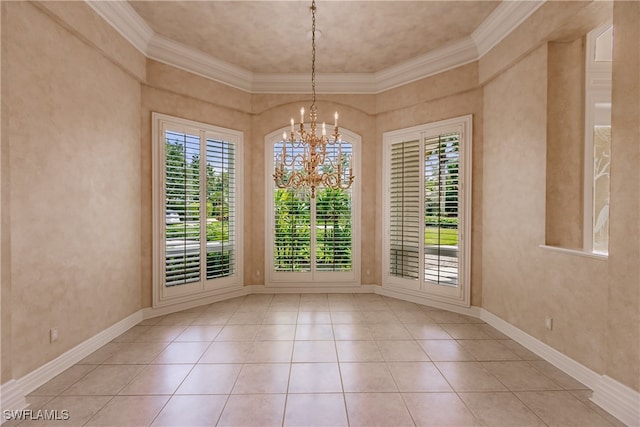 unfurnished dining area with an inviting chandelier, crown molding, and light tile patterned floors