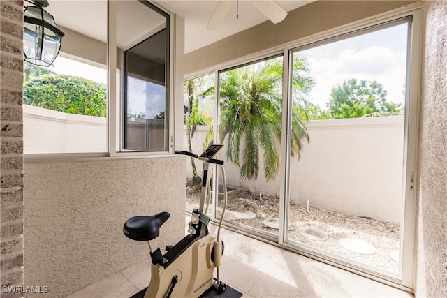 exercise area with ceiling fan