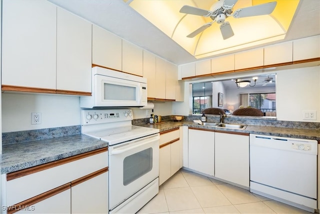 kitchen featuring sink, light tile patterned floors, white cabinetry, white appliances, and ceiling fan