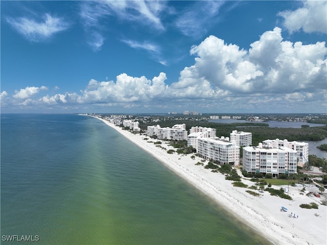 bird's eye view featuring a beach view and a water view