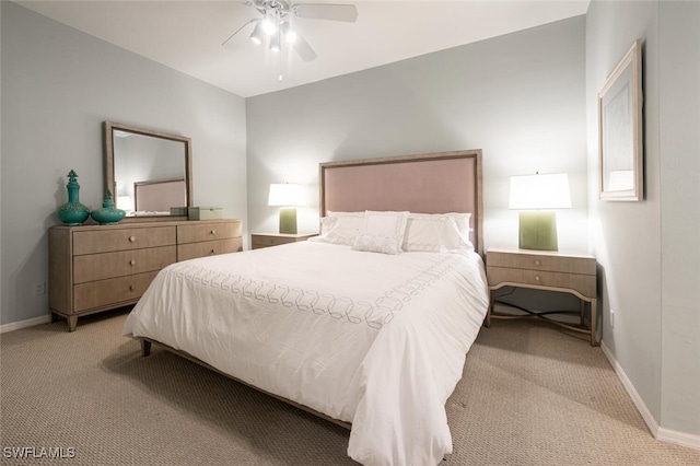 bedroom with ceiling fan and light colored carpet