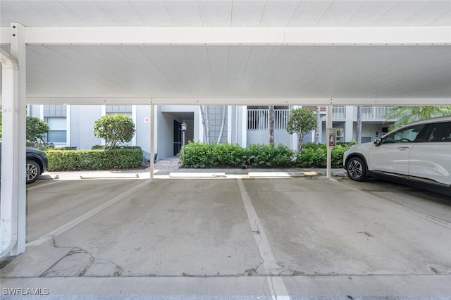 view of parking with a carport