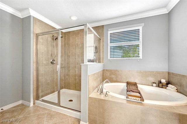 bathroom with plus walk in shower, tile patterned floors, and crown molding