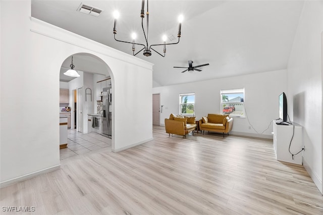 living room featuring ceiling fan and light wood-type flooring