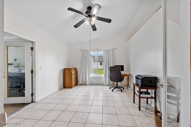 tiled home office featuring vaulted ceiling and ceiling fan