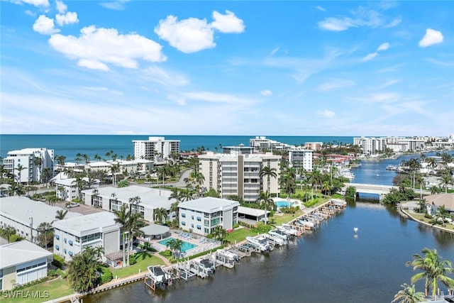 drone / aerial view with a water view