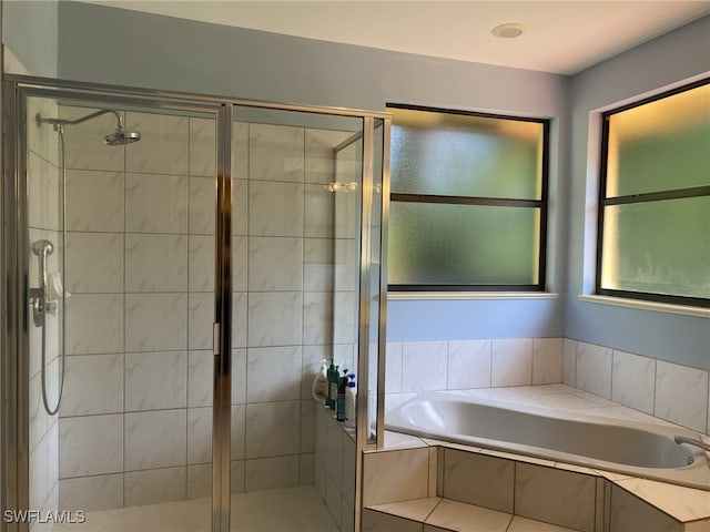 bathroom featuring plus walk in shower