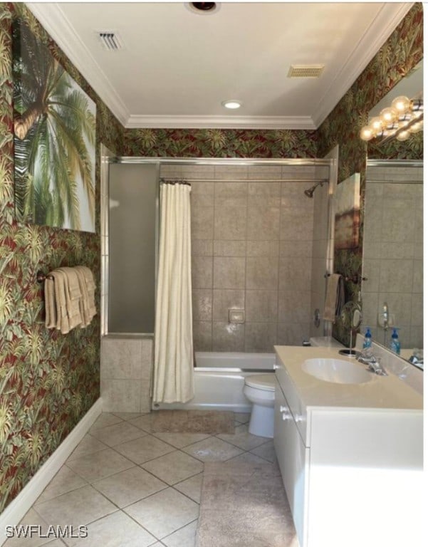 full bathroom featuring shower / bath combo with shower curtain, ornamental molding, vanity, and toilet