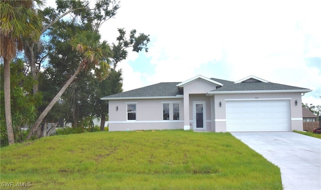 ranch-style home featuring a garage and a front lawn