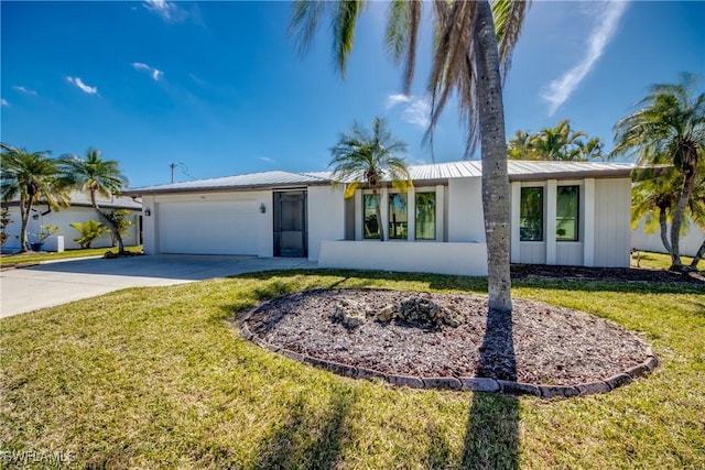 single story home with a garage and a front yard