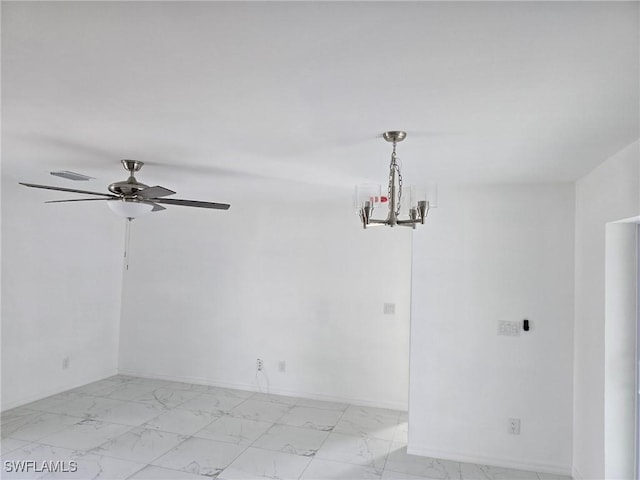 unfurnished room featuring visible vents, marble finish floor, ceiling fan with notable chandelier, and baseboards