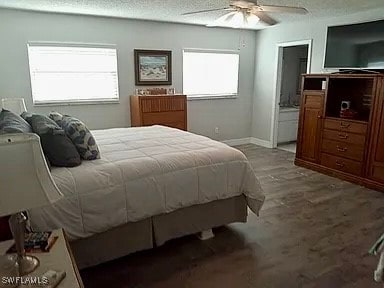 bedroom featuring ceiling fan and a textured ceiling