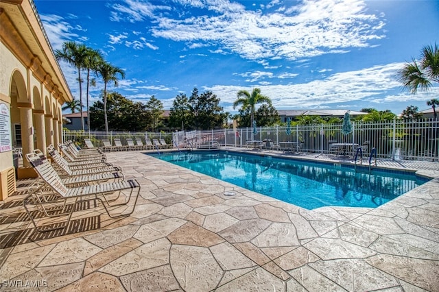 view of pool featuring a patio area