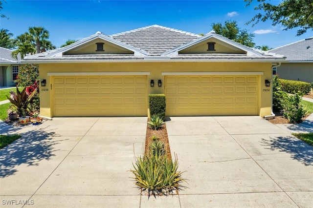 ranch-style home with a garage