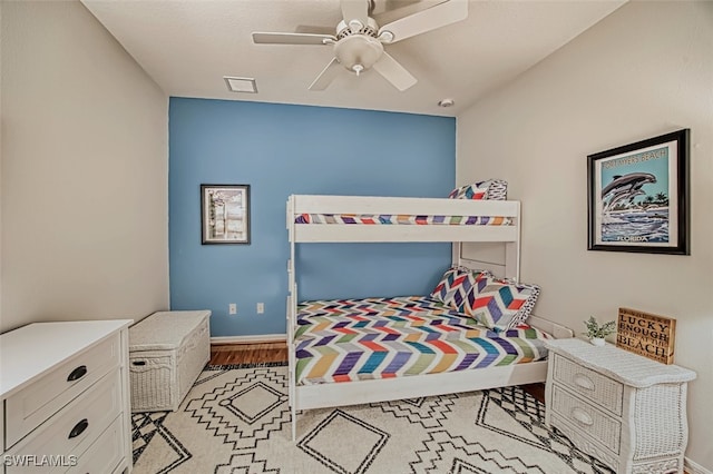 bedroom featuring light wood-type flooring and ceiling fan