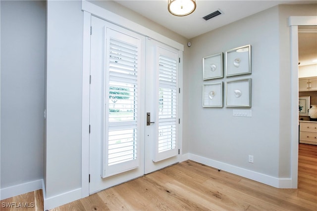 doorway featuring light hardwood / wood-style flooring