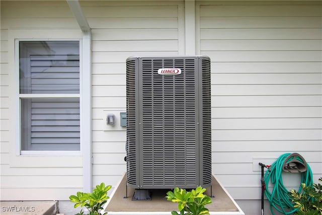 exterior details with wooden walls and central AC