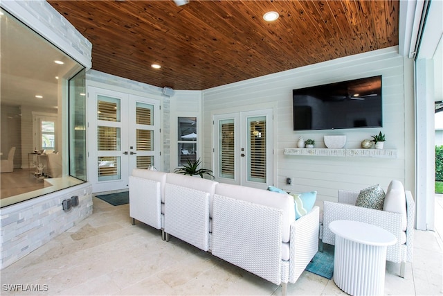 living room with wooden ceiling and french doors