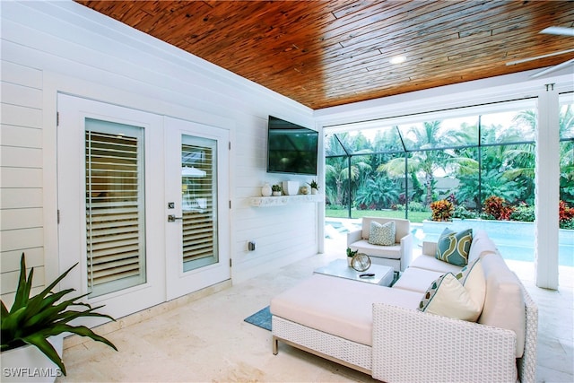 sunroom featuring french doors and wooden ceiling