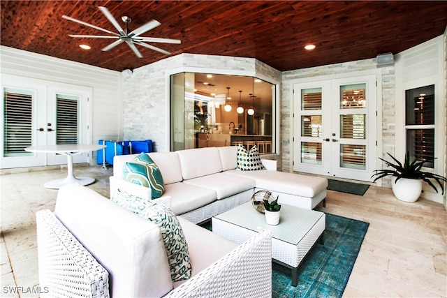 living room featuring french doors, wooden walls, ceiling fan, and wooden ceiling