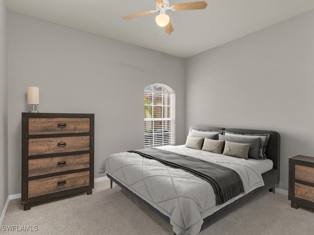 bedroom with ceiling fan and carpet floors