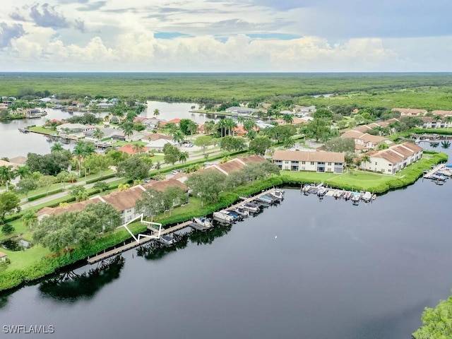 birds eye view of property featuring a water view