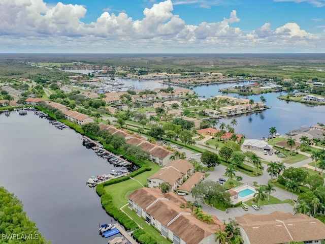 drone / aerial view with a water view