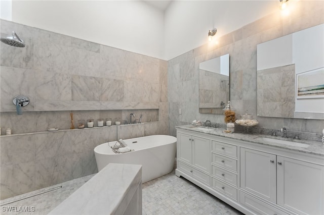 bathroom with vanity, independent shower and bath, and tile walls