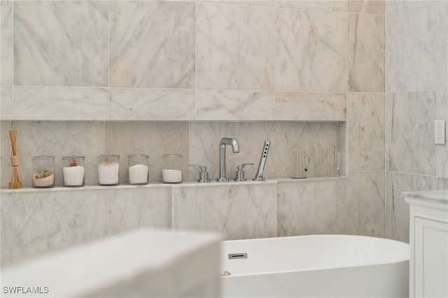 interior space featuring a bath and vanity