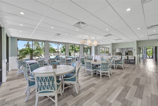 dining area with recessed lighting, visible vents, and light wood-style floors