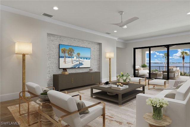 living room featuring light hardwood / wood-style flooring, ornamental molding, and ceiling fan