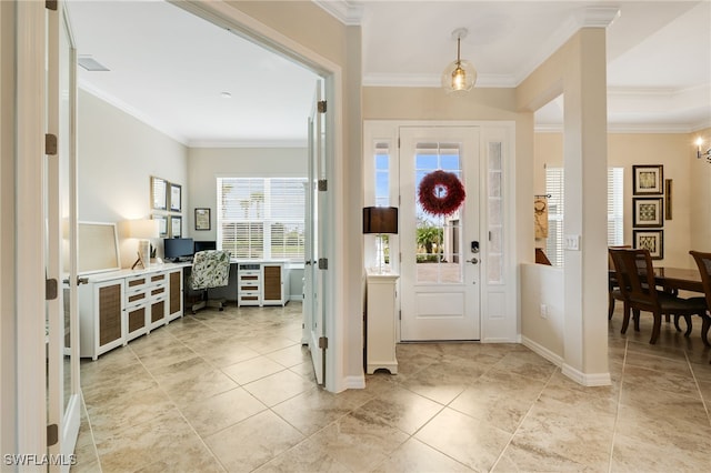 entrance foyer featuring crown molding