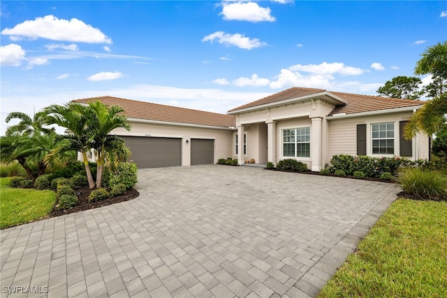 view of front of property with a garage