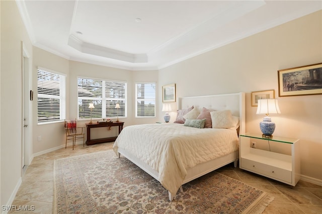 bedroom with a raised ceiling, light tile patterned floors, and crown molding