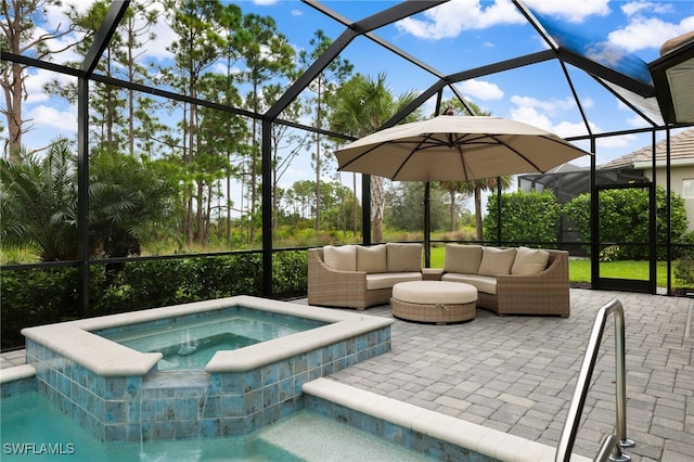 view of swimming pool featuring an in ground hot tub, an outdoor hangout area, glass enclosure, and a patio area