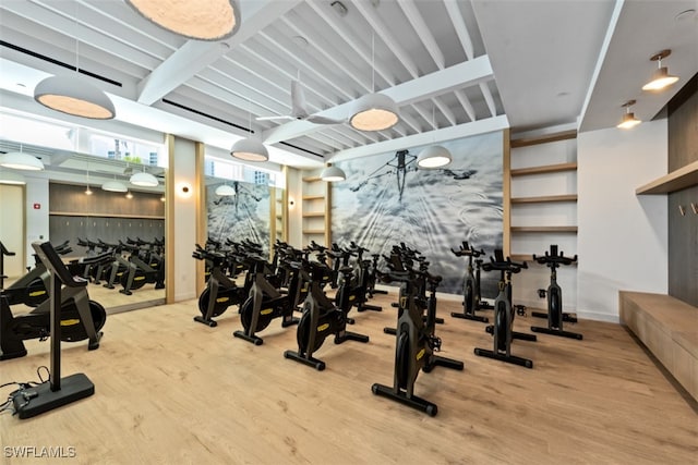 workout area with light wood-type flooring