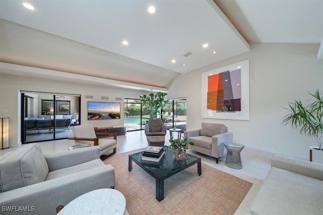 living room featuring vaulted ceiling