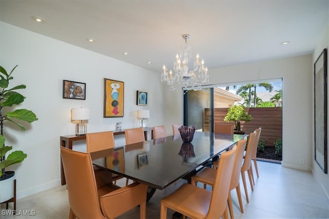 dining area featuring a chandelier