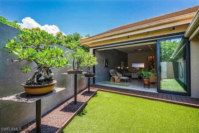 view of yard featuring a deck